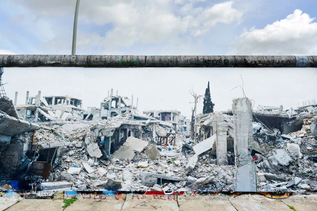 (E) La guerra de Siria en el Muro de Berlín